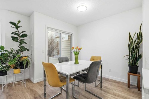 310 Hawkstone Manor Nw, Calgary, AB - Indoor Photo Showing Dining Room