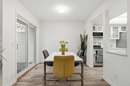 310 Hawkstone Manor Nw, Calgary, AB - Indoor Photo Showing Dining Room