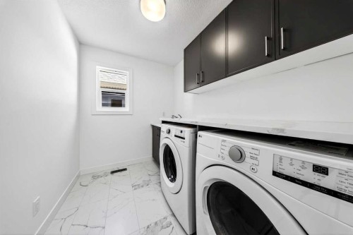 152 Copperhead Road Se, Calgary, AB - Indoor Photo Showing Laundry Room