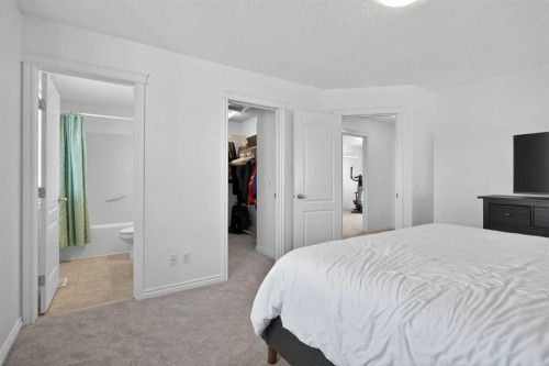 268 Westmount Crescent, Okotoks, AB - Indoor Photo Showing Bedroom
