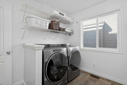 268 Westmount Crescent, Okotoks, AB - Indoor Photo Showing Laundry Room