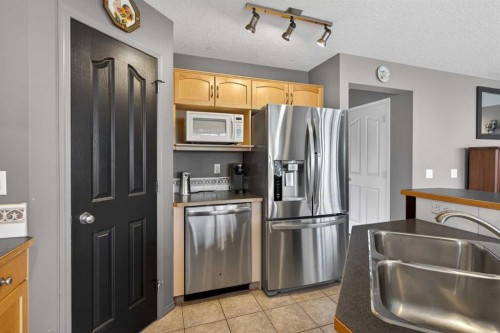 204 Citadel Meadow Close Nw, Calgary, AB - Indoor Photo Showing Kitchen With Double Sink