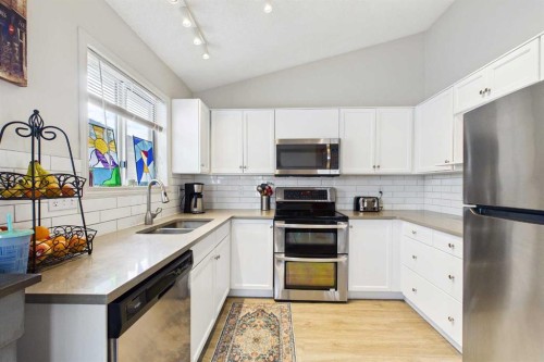 14 Citadel Drive Nw, Calgary, AB - Indoor Photo Showing Kitchen With Double Sink