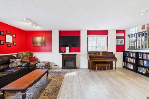 14 Citadel Drive Nw, Calgary, AB - Indoor Photo Showing Living Room With Fireplace