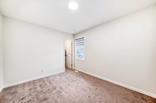 332 Magnolia Crescent Se, Calgary, AB - Indoor Photo Showing Other Room