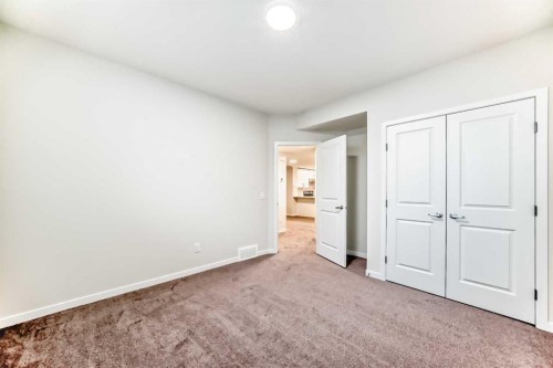 332 Magnolia Crescent Se, Calgary, AB - Indoor Photo Showing Other Room