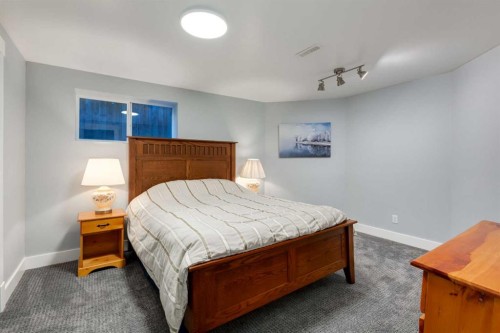 9915 Patton Road Sw, Calgary, AB - Indoor Photo Showing Bedroom