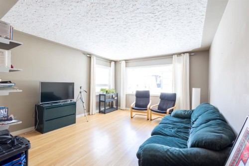719 27 Avenue Nw, Calgary, AB - Indoor Photo Showing Living Room