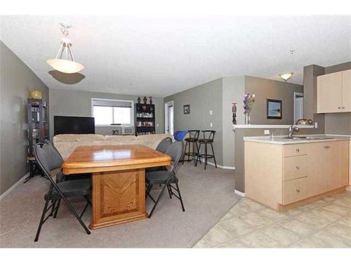 2314-10 Prestwick Bay Se, Calgary, AB - Indoor Photo Showing Dining Room
