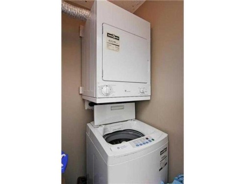 2314-10 Prestwick Bay Se, Calgary, AB - Indoor Photo Showing Laundry Room