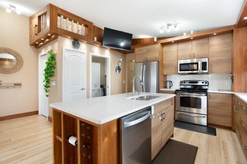 2201-230 Eversyde Boulevard Sw, Calgary, AB - Indoor Photo Showing Kitchen With Double Sink