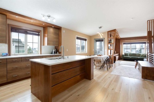 2201-230 Eversyde Boulevard Sw, Calgary, AB - Indoor Photo Showing Kitchen With Double Sink