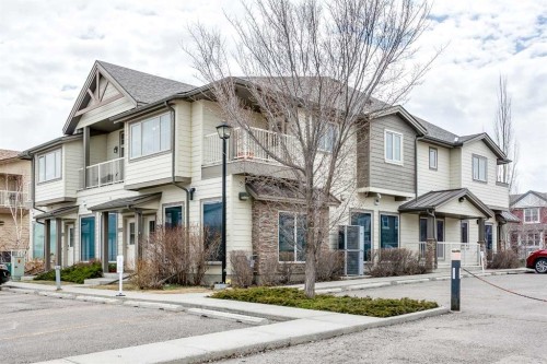 2201-230 Eversyde Boulevard Sw, Calgary, AB - Outdoor With Facade