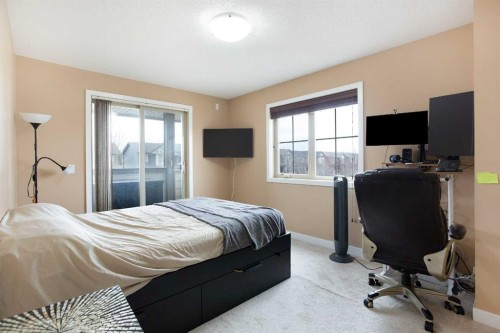 2201-230 Eversyde Boulevard Sw, Calgary, AB - Indoor Photo Showing Bedroom