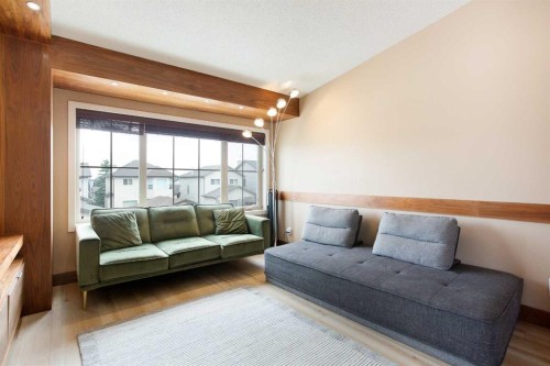 2201-230 Eversyde Boulevard Sw, Calgary, AB - Indoor Photo Showing Living Room