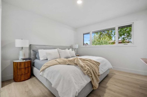 235 Lake Rosen Crescent Se, Calgary, AB - Indoor Photo Showing Bedroom