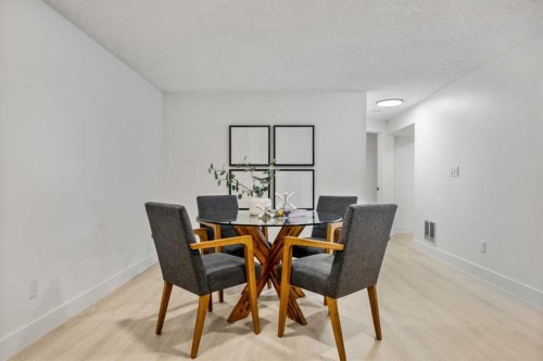 235 Lake Rosen Crescent Se, Calgary, AB - Indoor Photo Showing Dining Room