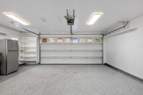235 Lake Rosen Crescent Se, Calgary, AB - Indoor Photo Showing Garage
