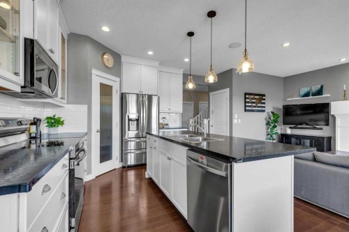 317 Panora Way Nw, Calgary, AB - Indoor Photo Showing Kitchen With Stainless Steel Kitchen With Double Sink With Upgraded Kitchen