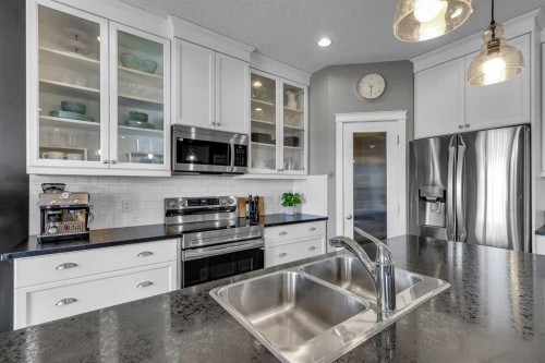 317 Panora Way Nw, Calgary, AB - Indoor Photo Showing Kitchen With Stainless Steel Kitchen With Double Sink With Upgraded Kitchen