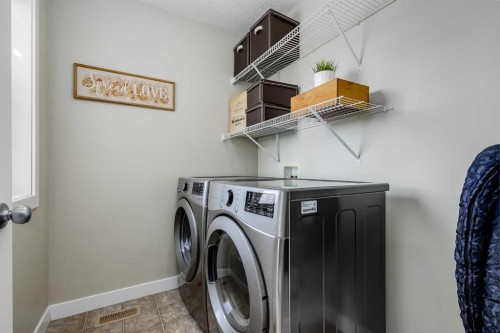 317 Panora Way Nw, Calgary, AB - Indoor Photo Showing Laundry Room