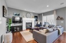 317 Panora Way Nw, Calgary, AB  - Indoor Photo Showing Living Room With Fireplace 