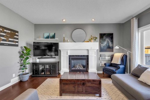 317 Panora Way Nw, Calgary, AB - Indoor Photo Showing Living Room With Fireplace