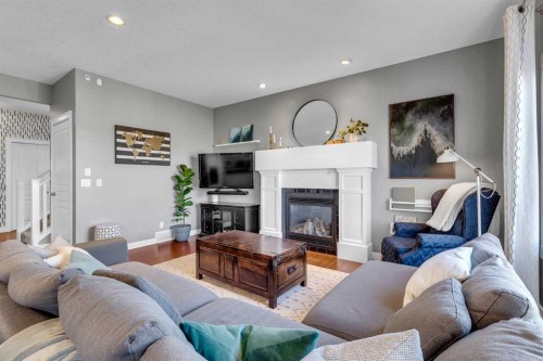 317 Panora Way Nw, Calgary, AB - Indoor Photo Showing Living Room With Fireplace