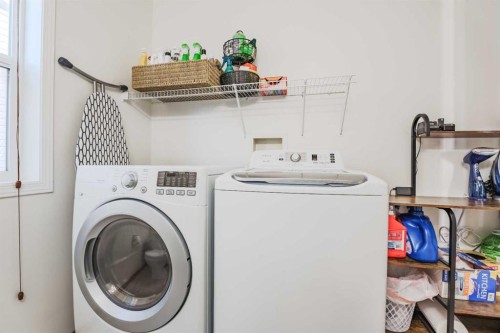 68 Bridleridge Gardens Sw, Calgary, AB - Indoor Photo Showing Laundry Room