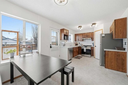 68 Bridleridge Gardens Sw, Calgary, AB - Indoor Photo Showing Kitchen