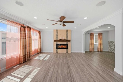 256 Saddlecrest Boulevard Ne, Calgary, AB - Indoor With Fireplace