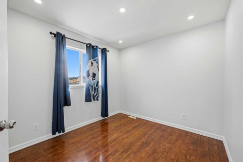 256 Saddlecrest Boulevard Ne, Calgary, AB - Indoor Photo Showing Other Room
