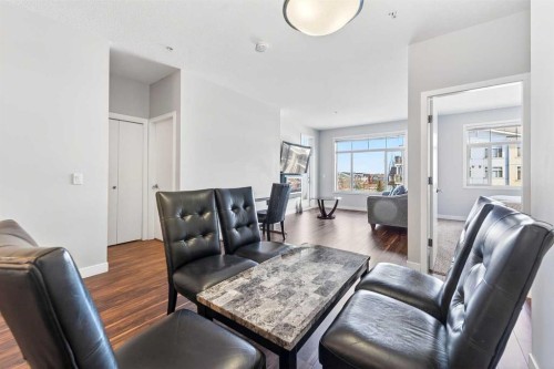 301-16 Auburn Bay Link Se, Calgary, AB - Indoor Photo Showing Living Room