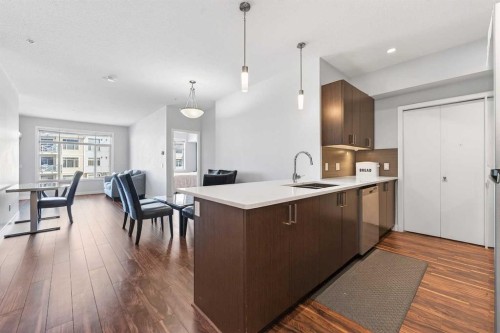 301-16 Auburn Bay Link Se, Calgary, AB - Indoor Photo Showing Kitchen With Upgraded Kitchen