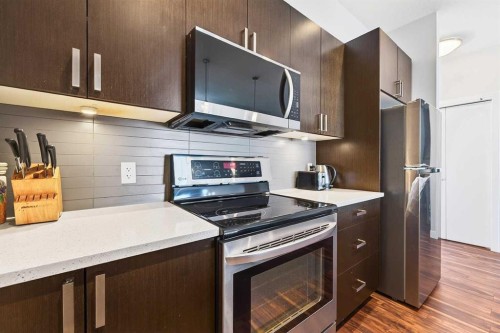 301-16 Auburn Bay Link Se, Calgary, AB - Indoor Photo Showing Kitchen