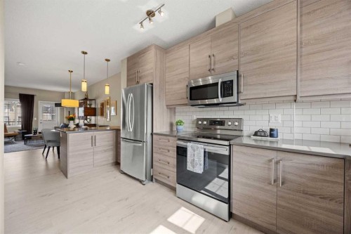 496 Nolan Hill Boulevard Nw, Calgary, AB - Indoor Photo Showing Kitchen With Stainless Steel Kitchen With Upgraded Kitchen