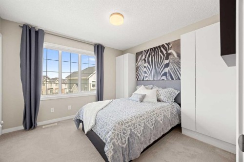 496 Nolan Hill Boulevard Nw, Calgary, AB - Indoor Photo Showing Bedroom