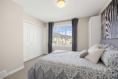 496 Nolan Hill Boulevard Nw, Calgary, AB - Indoor Photo Showing Bedroom