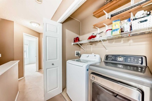 112 Country Village Cape Ne, Calgary, AB - Indoor Photo Showing Laundry Room