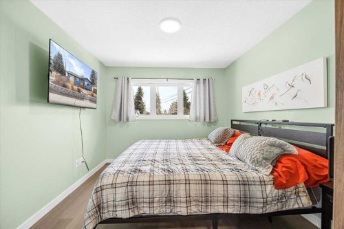 9743 Austin Road Se, Calgary, AB - Indoor Photo Showing Bedroom