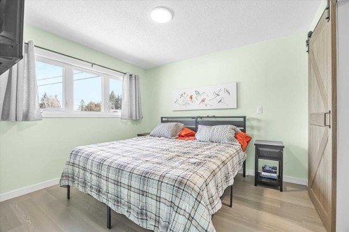 9743 Austin Road Se, Calgary, AB - Indoor Photo Showing Bedroom