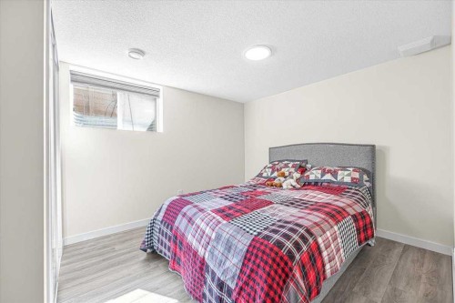 9743 Austin Road Se, Calgary, AB - Indoor Photo Showing Bedroom