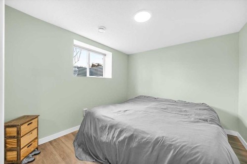 9743 Austin Road Se, Calgary, AB - Indoor Photo Showing Bedroom
