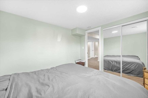 9743 Austin Road Se, Calgary, AB - Indoor Photo Showing Bedroom