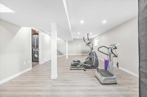 9743 Austin Road Se, Calgary, AB - Indoor Photo Showing Gym Room