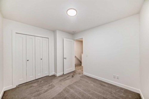 76 Tuscany Summit Square Nw, Calgary, AB - Indoor Photo Showing Other Room