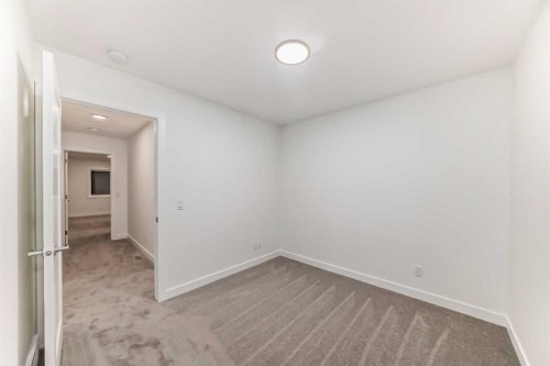 76 Tuscany Summit Square Nw, Calgary, AB - Indoor Photo Showing Other Room