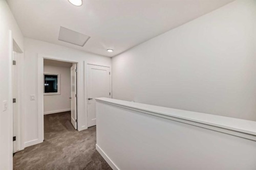 76 Tuscany Summit Square Nw, Calgary, AB - Indoor Photo Showing Other Room