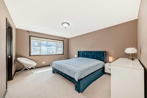 229 Panamount Road Nw, Calgary, AB - Indoor Photo Showing Bedroom