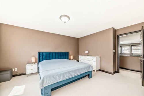 229 Panamount Road Nw, Calgary, AB - Indoor Photo Showing Bedroom